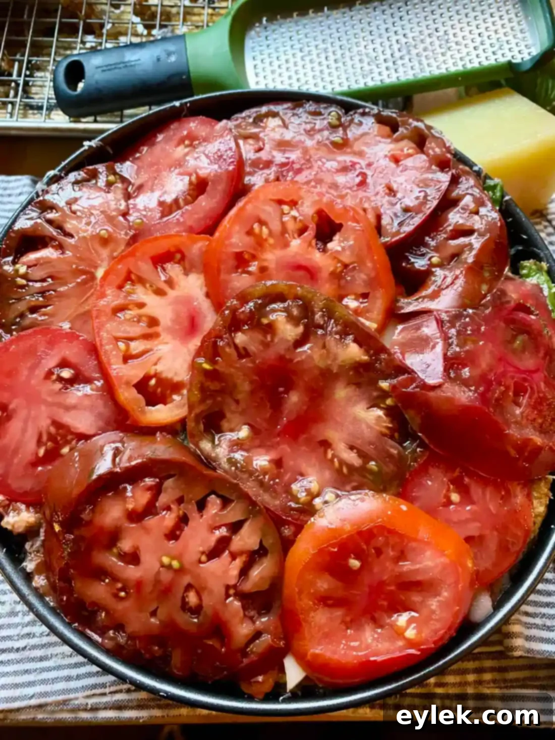 Roasted Eggplant and Zucchini Al Forno 11 Tomatoes layered on top of Veggie al Forno