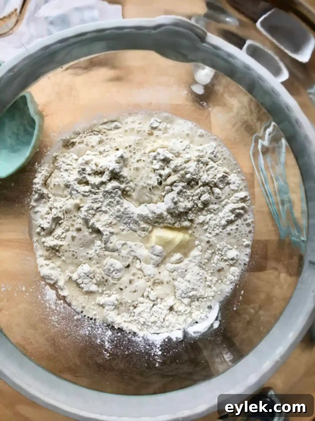 Dough being kneaded in a stand mixer