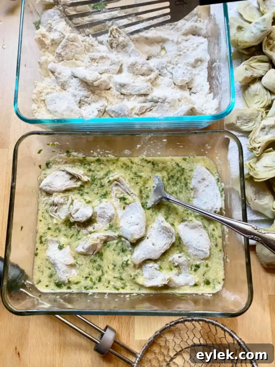 Two bowls set up for dredging artichoke hearts