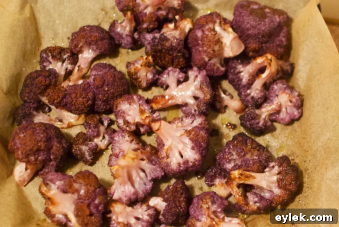 Perfectly roasted potatoes topped with fresh herbs and Parmesan.