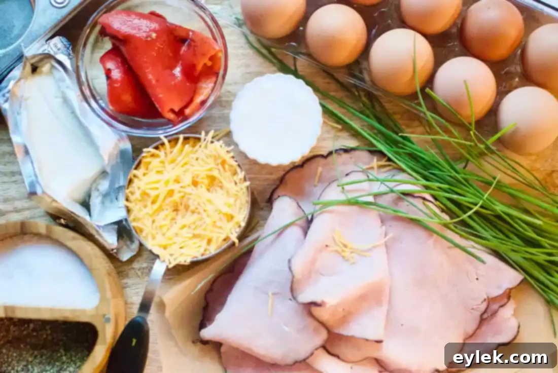 Delicious Black Forest Ham & Egg Cups in a muffin tin, ready to eat