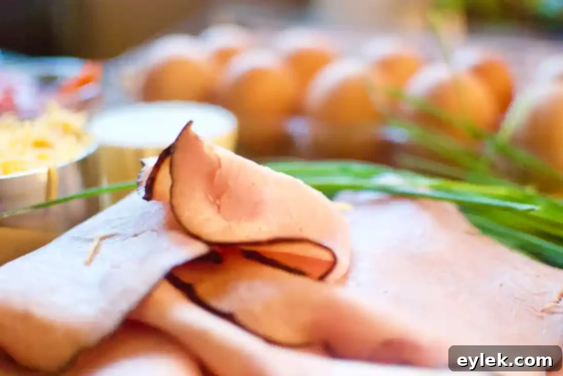 Close-up of Black Forest Ham slices in a muffin tin before filling
