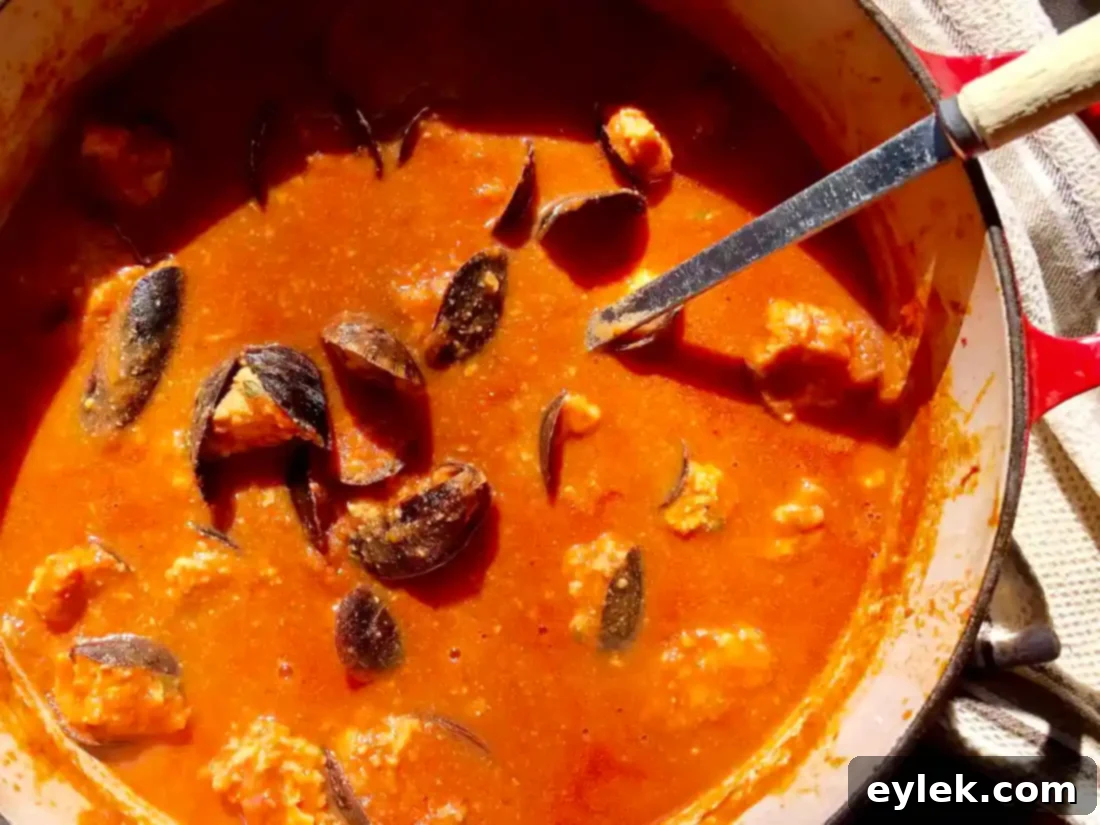 Homemade Stuffed Mussels Marinara simmering