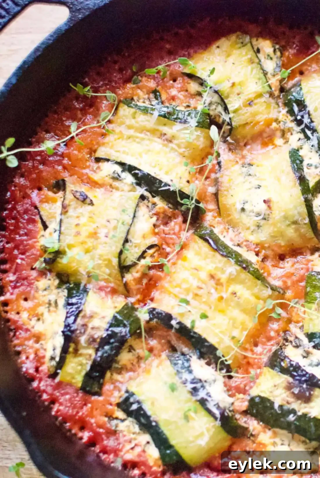 A dish of Zucchini Involtini with Swiss Chard and Ricotta, beautifully plated