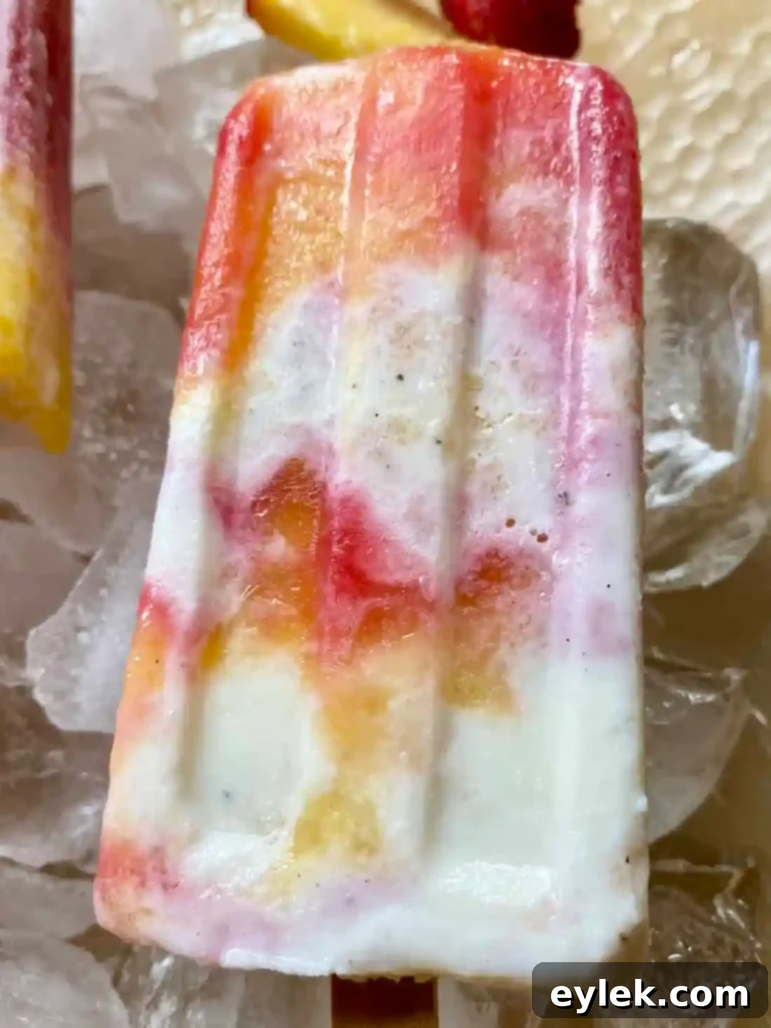 Finished Homemade Peach Melba Popsicle ready to eat