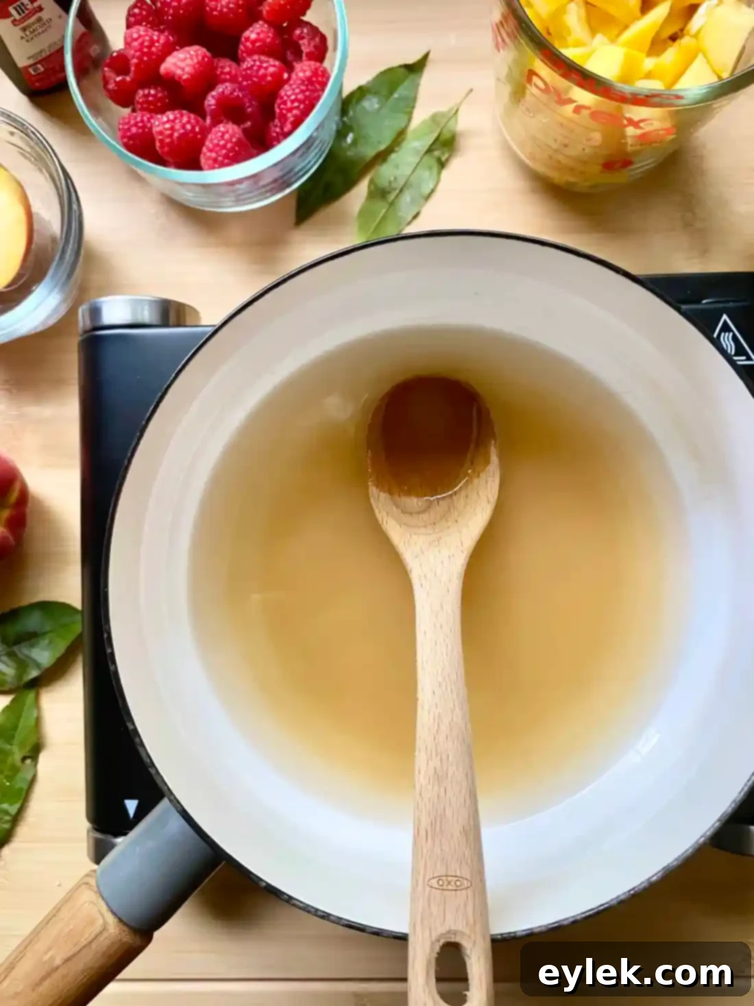 Preparing simple syrup for Peach Melba Popsicles