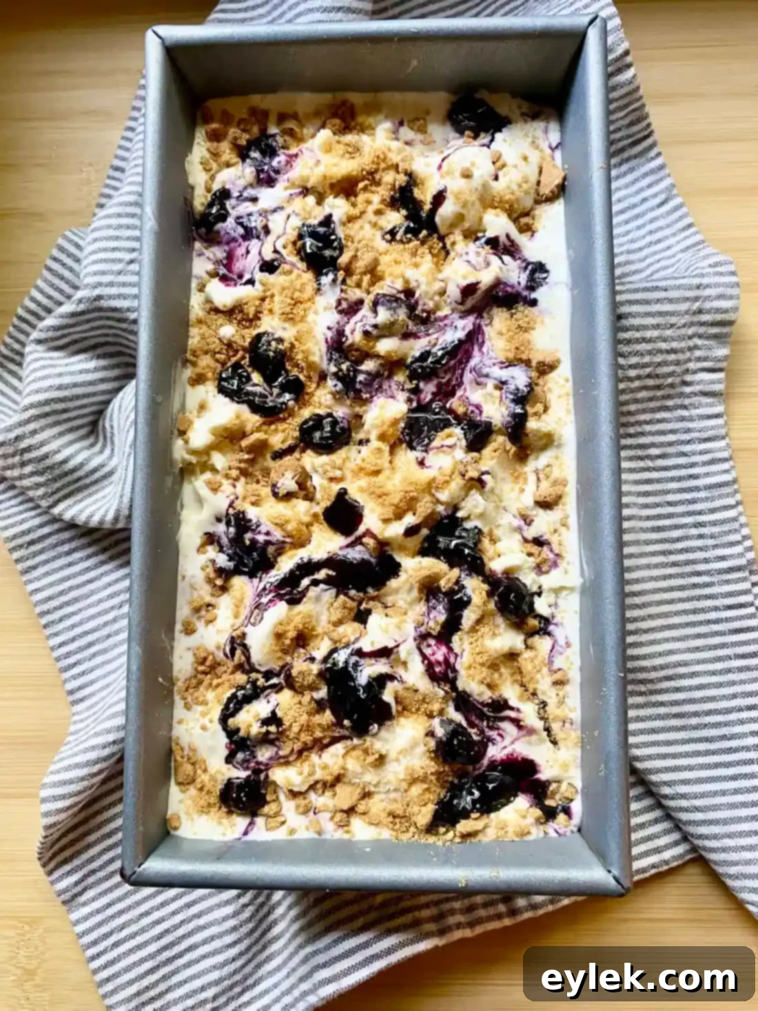 Blueberry cheesecake ice cream layers swirled