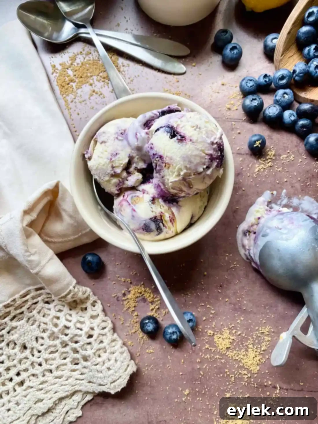 Scoops of blueberry cheesecake ice cream