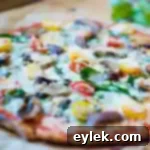 The Perfect Cauliflower Crust Pizza 17 The ultimate cauliflower crust pizza, freshly baked and ready to be sliced.