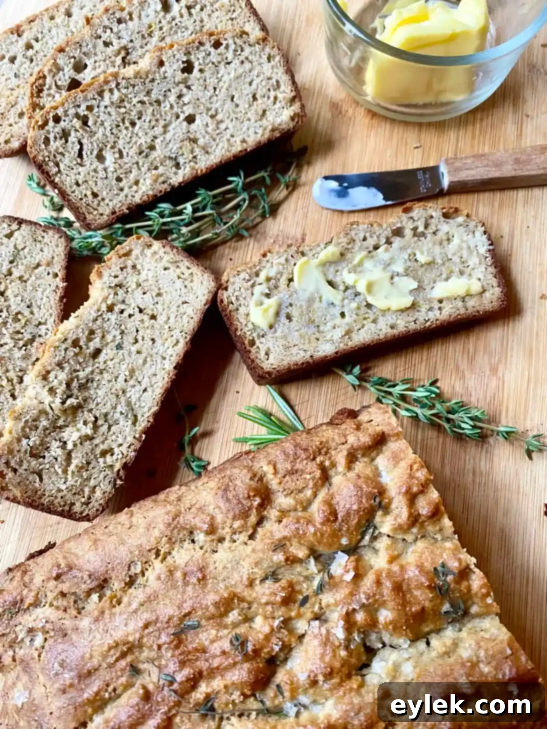 Rosemary & Thyme Almond Bread slice with spread