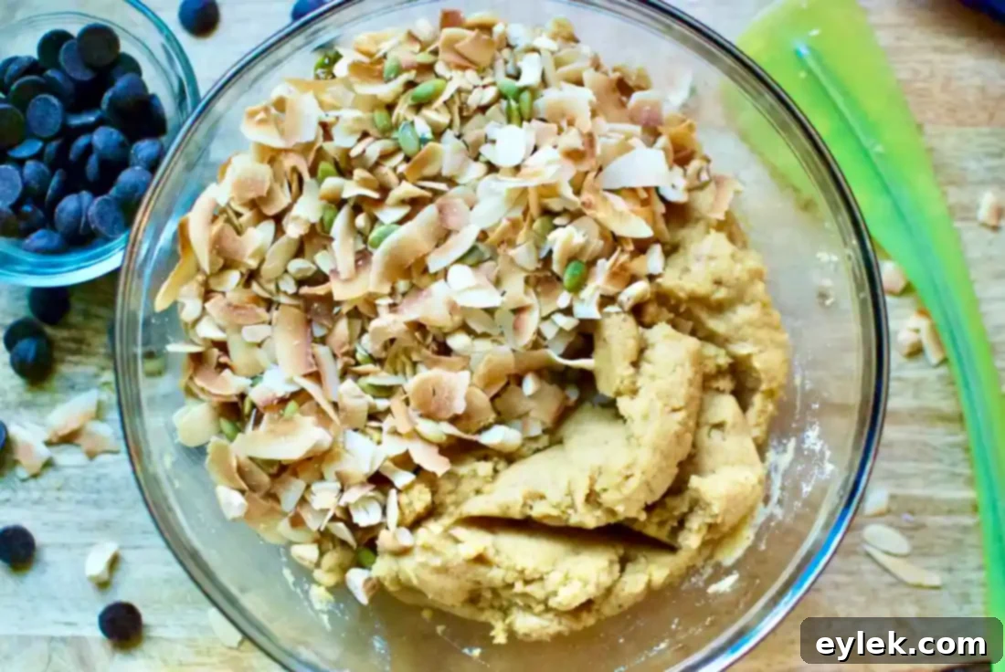 Cookie dough with nuts and flakes ready to be shaped
