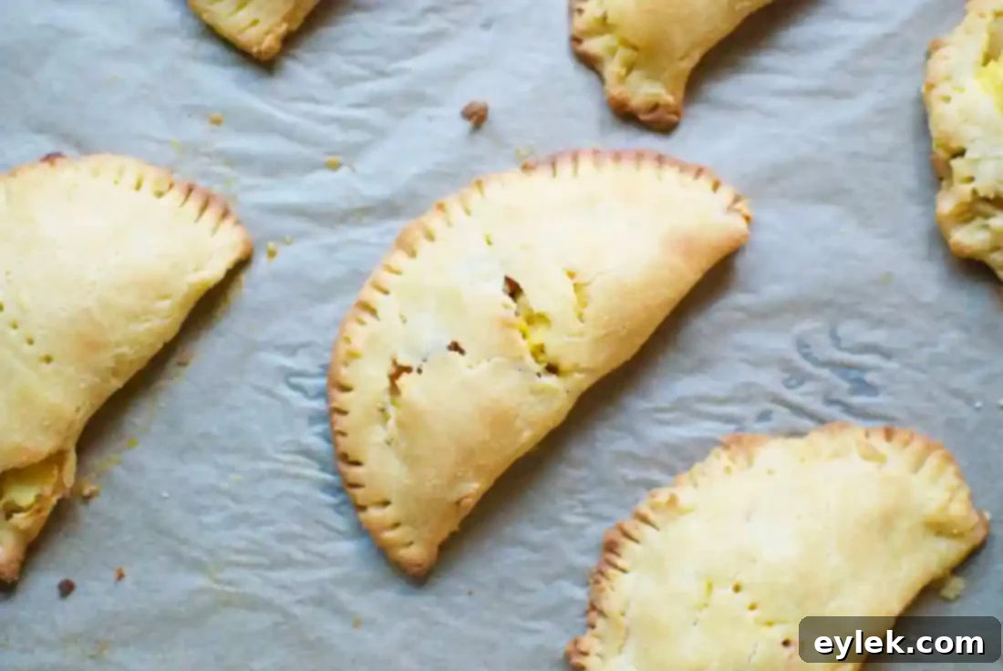Plated low-carb breakfast empanadas with side dishes
