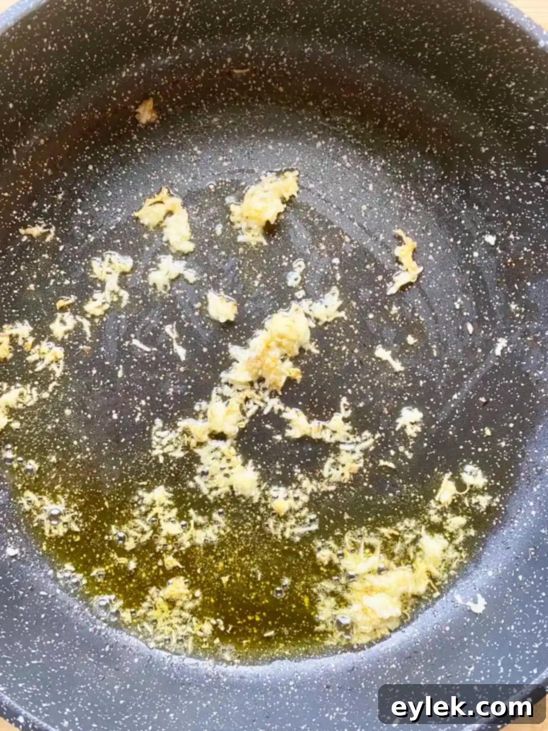 Deglazing the pan with white wine