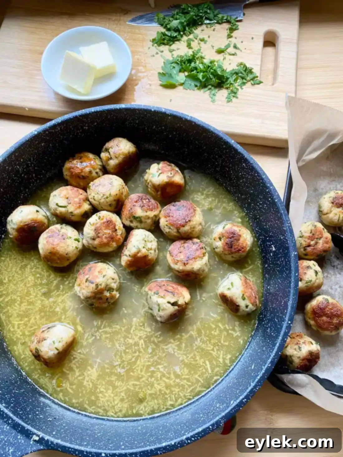 Zesty Chicken Piccata Meatballs 13 Meatballs simmering in piccata sauce