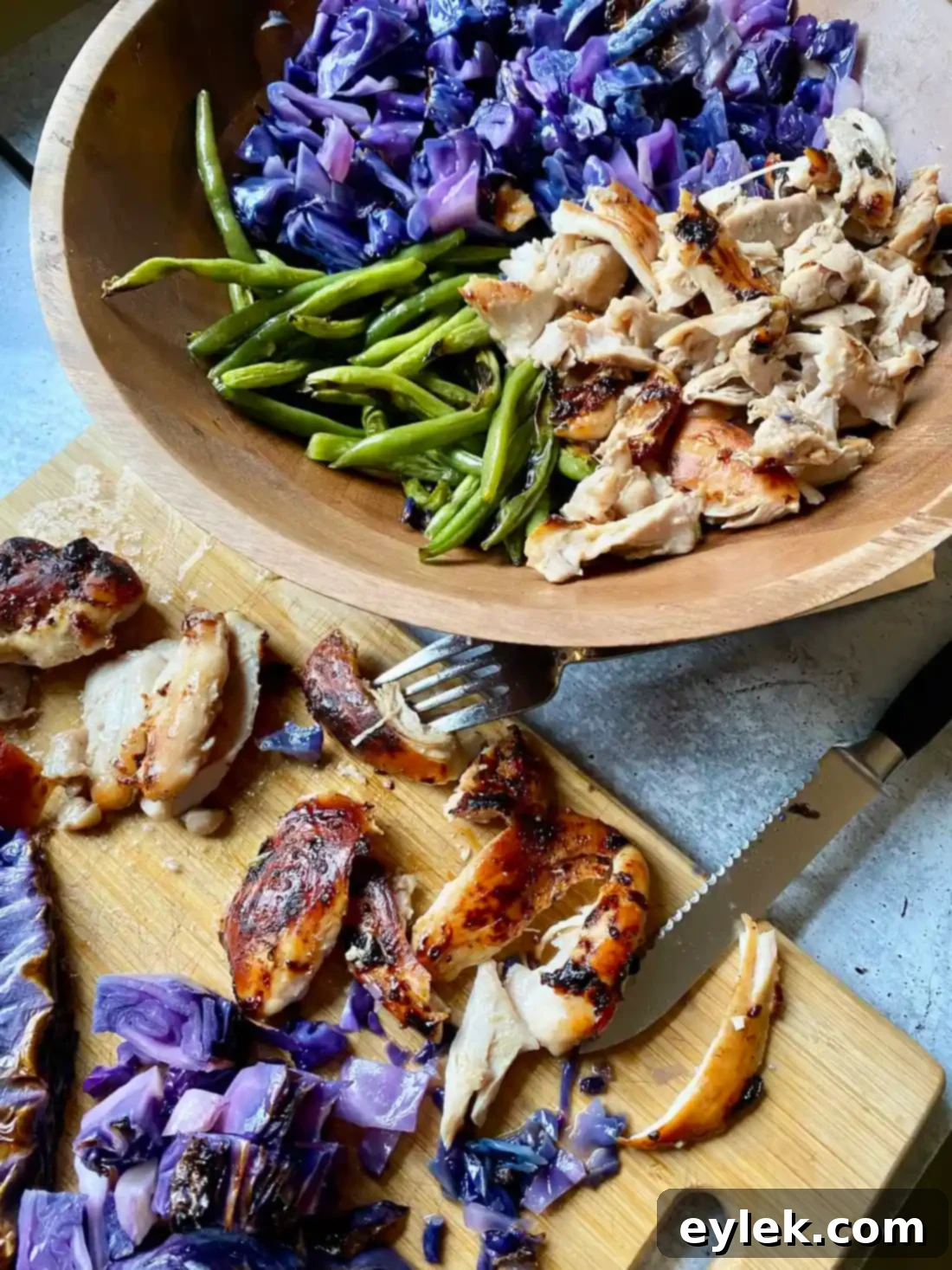 Crispy Sesame Chicken and Cabbage Salad 11 Shredding chicken for the salad