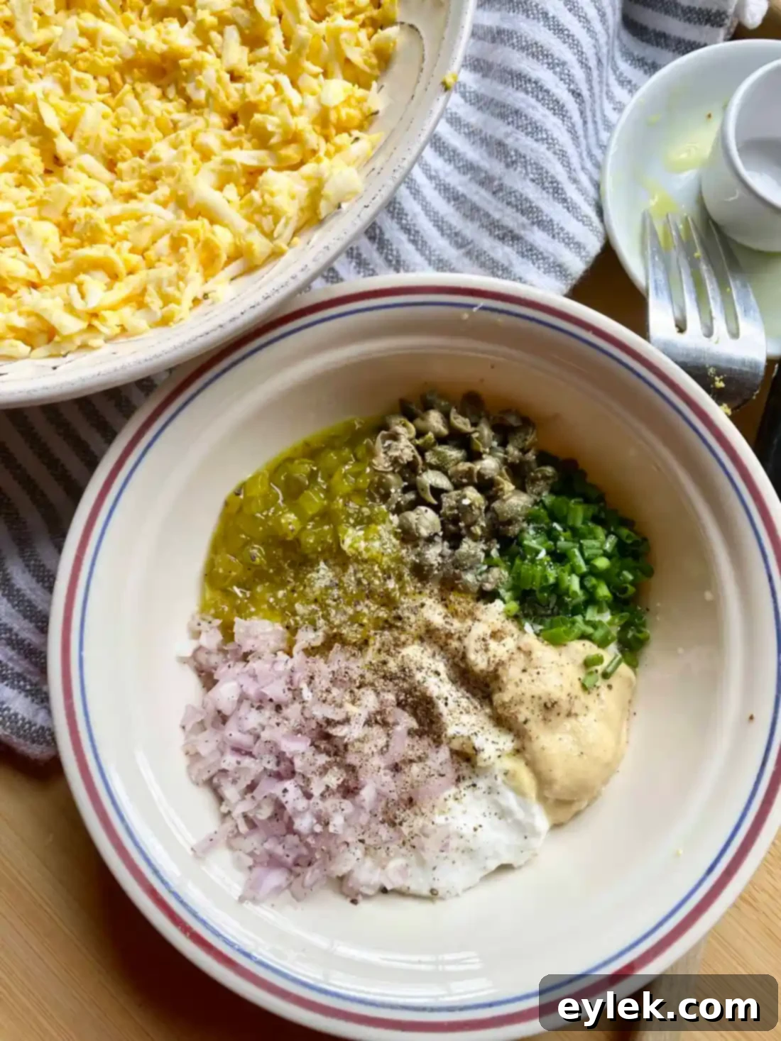 Easy Deviled Egg Dip - Adding Dressing to Eggs