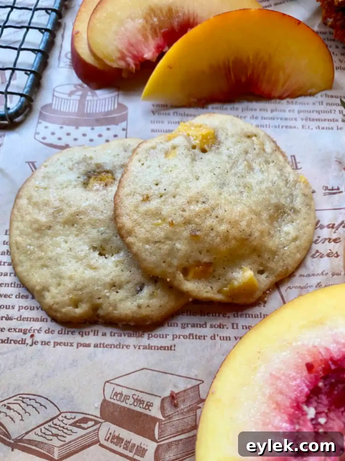 Cakey Peach Drop Cookies 15 Two peach cake drop cookies on a plate