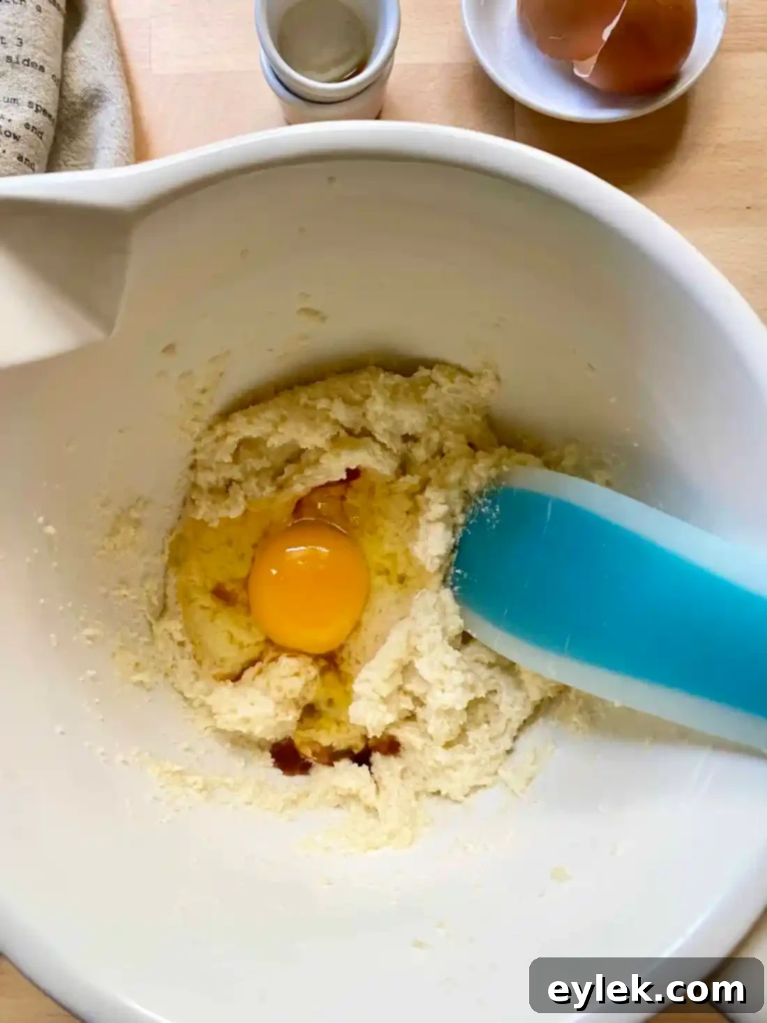 Cakey Peach Drop Cookies 5 Adding egg and vanilla to butter and sugar mixture
