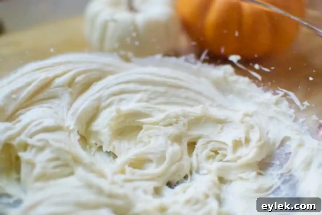 Smooth and creamy mixed cream cheese filling in a bowl