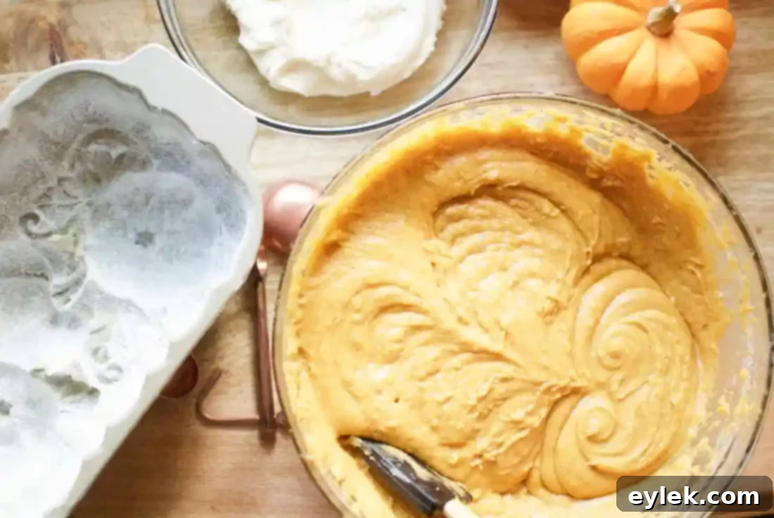 Pumpkin bread batter after combining wet and dry ingredients, smooth and ready to layer