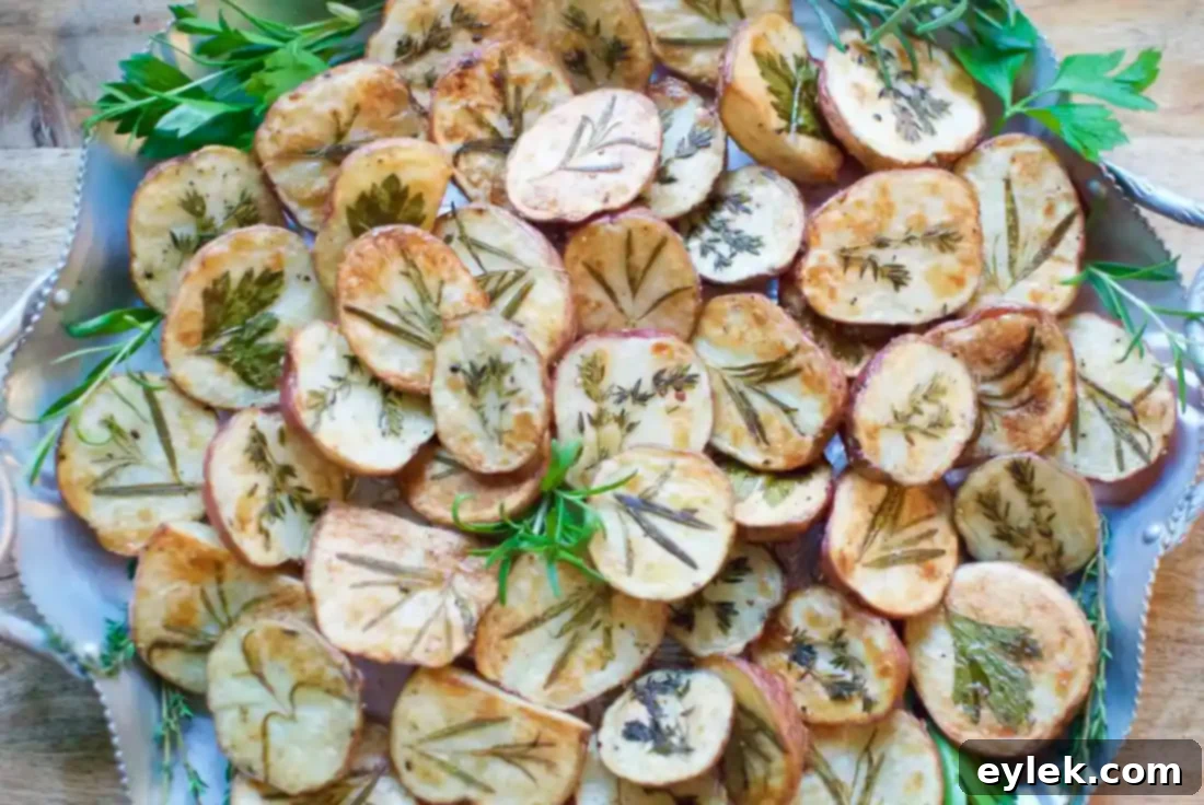 A festive table setting featuring Dressed-Up Herb Roasted Potatoes