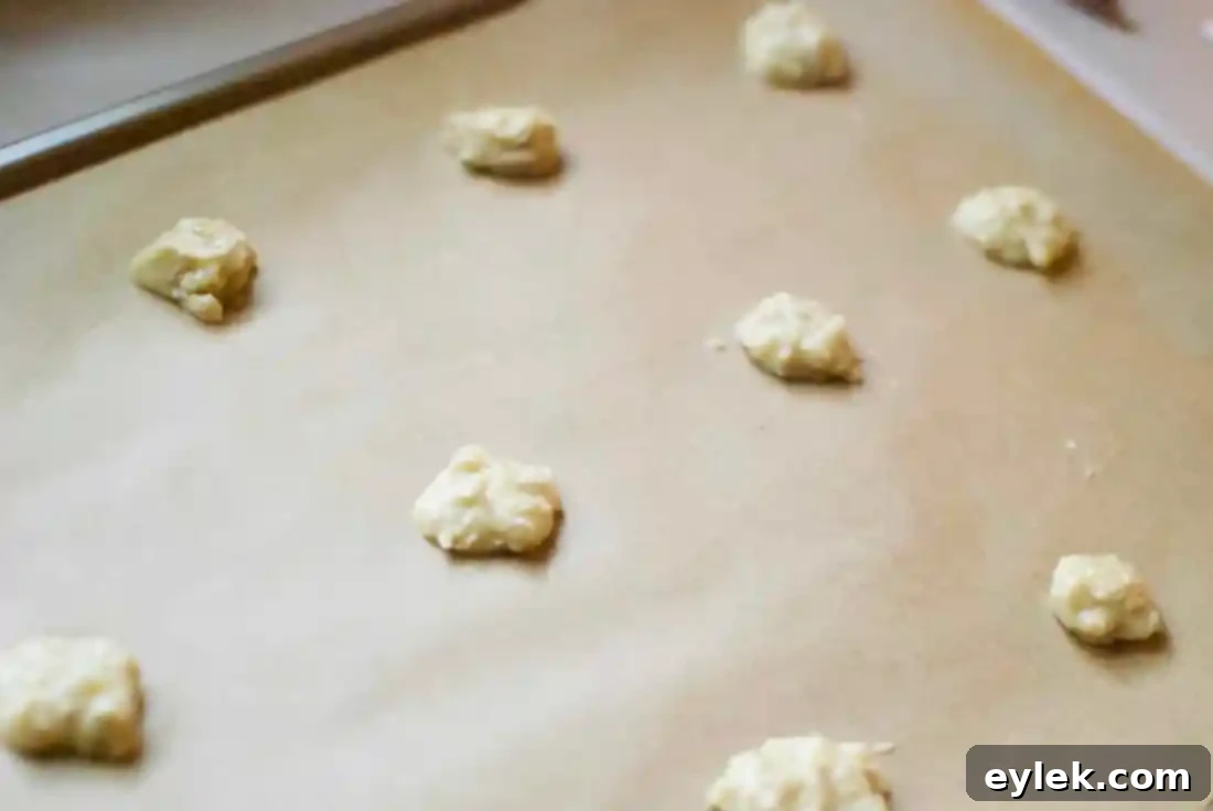 chocolate lace sandwich cookies baking on sheet
