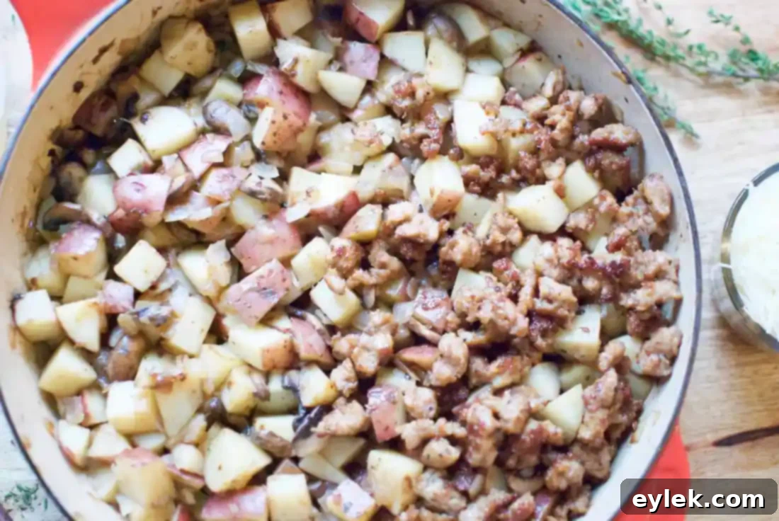 sausage, mushroom & potato gratin ready for oven
