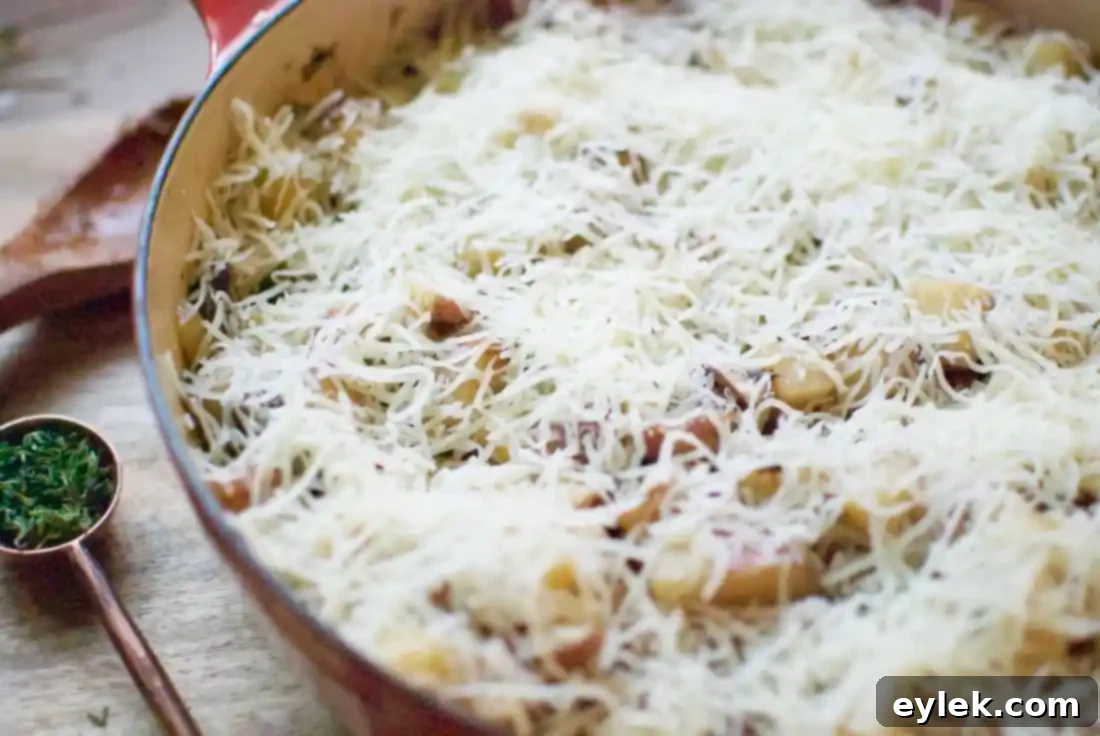 Sausage, Mushroom & Potato Gratin covered