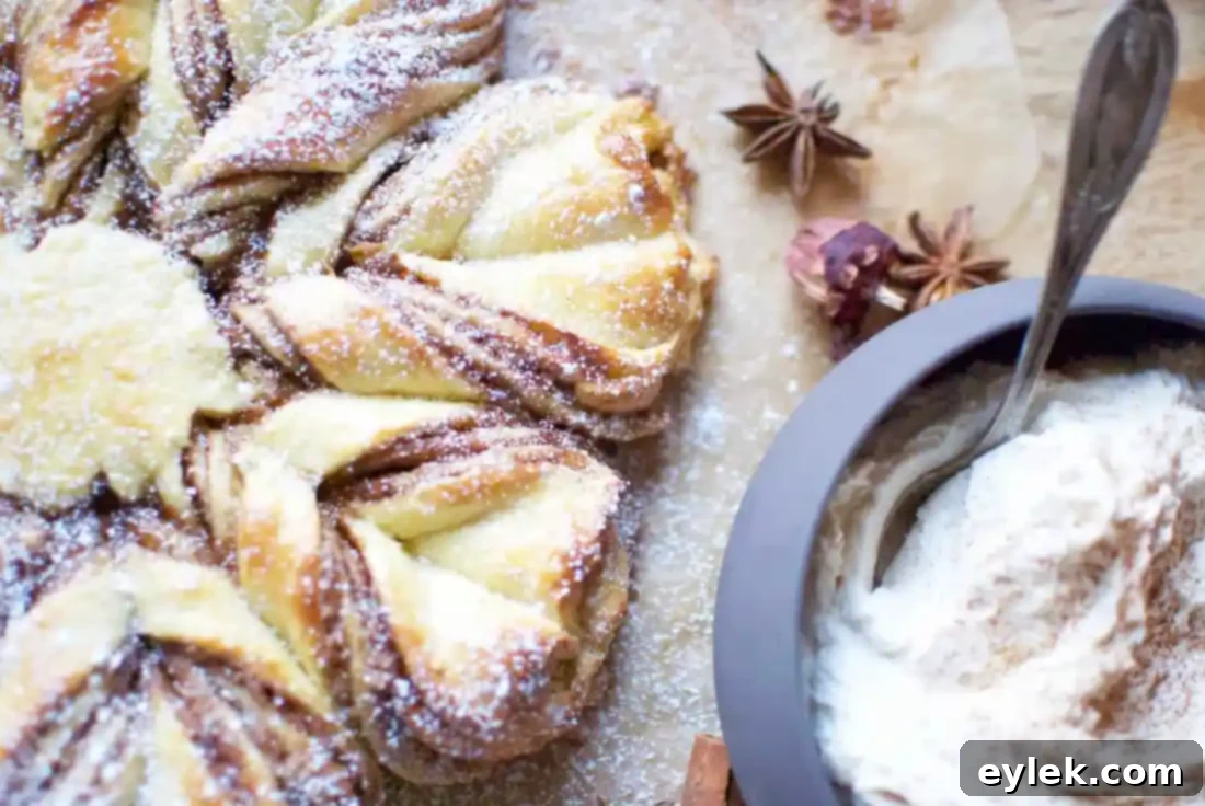 Cinnamon Star Bread with French Butter Icing on a serving platter