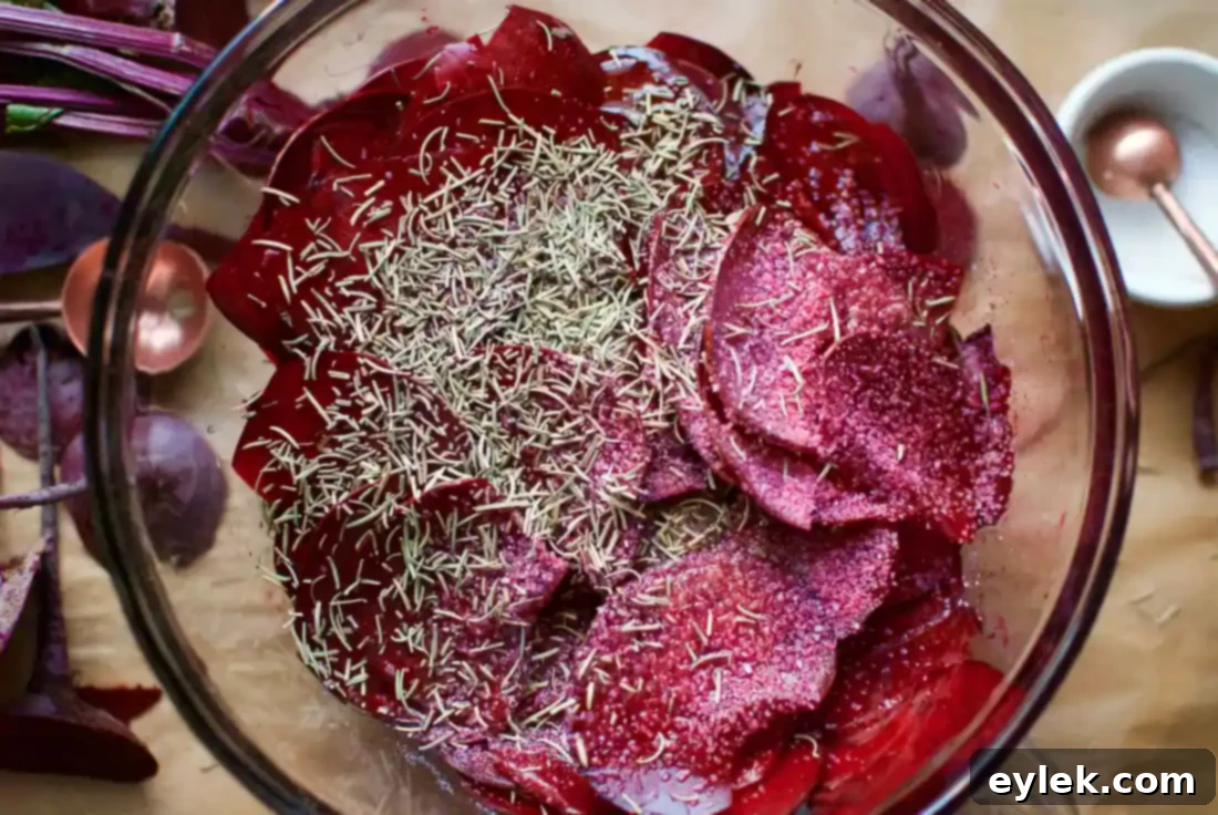 Slicing fresh beets using a mandoline slicer