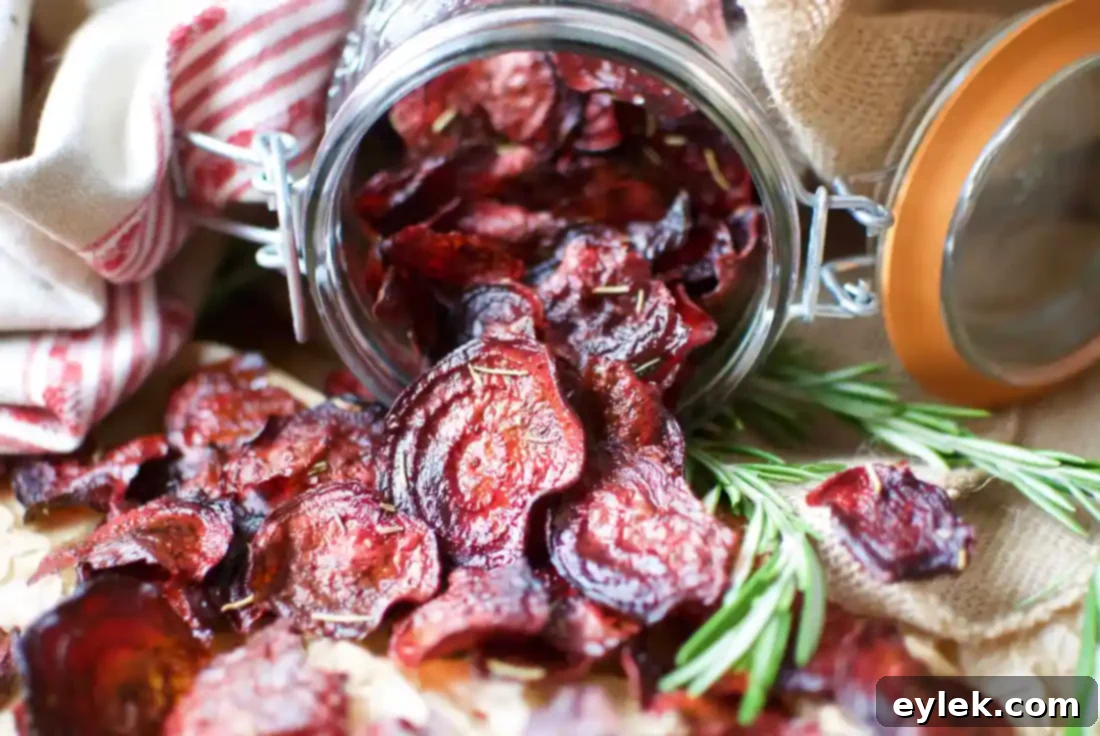 Bowl of freshly made beet and rosemary chips