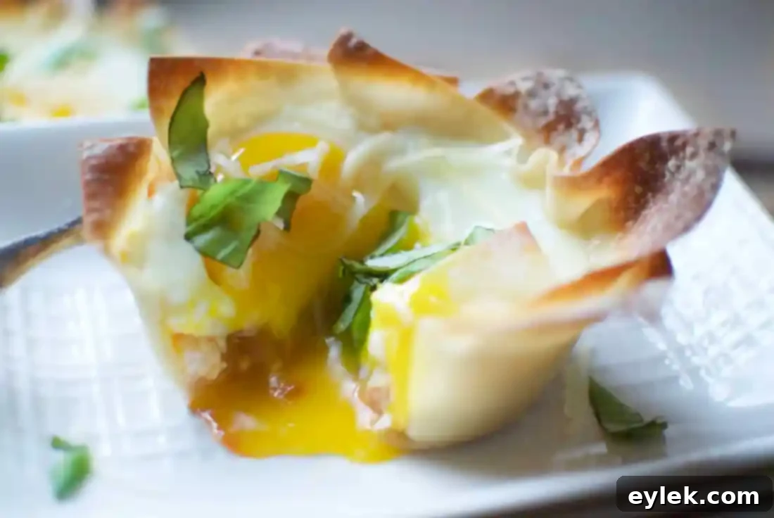 Another perspective of a single Italian Egg Wonton Cup, highlighting its delicious components.