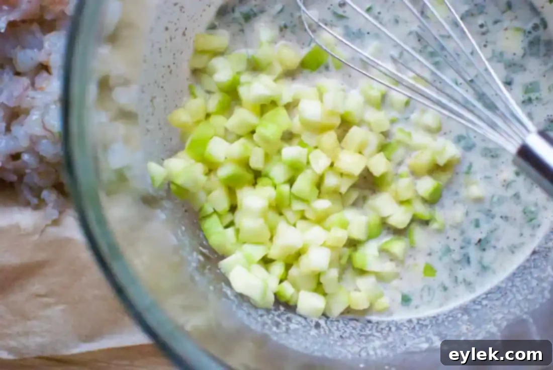 Adding zucchini to fritter batter