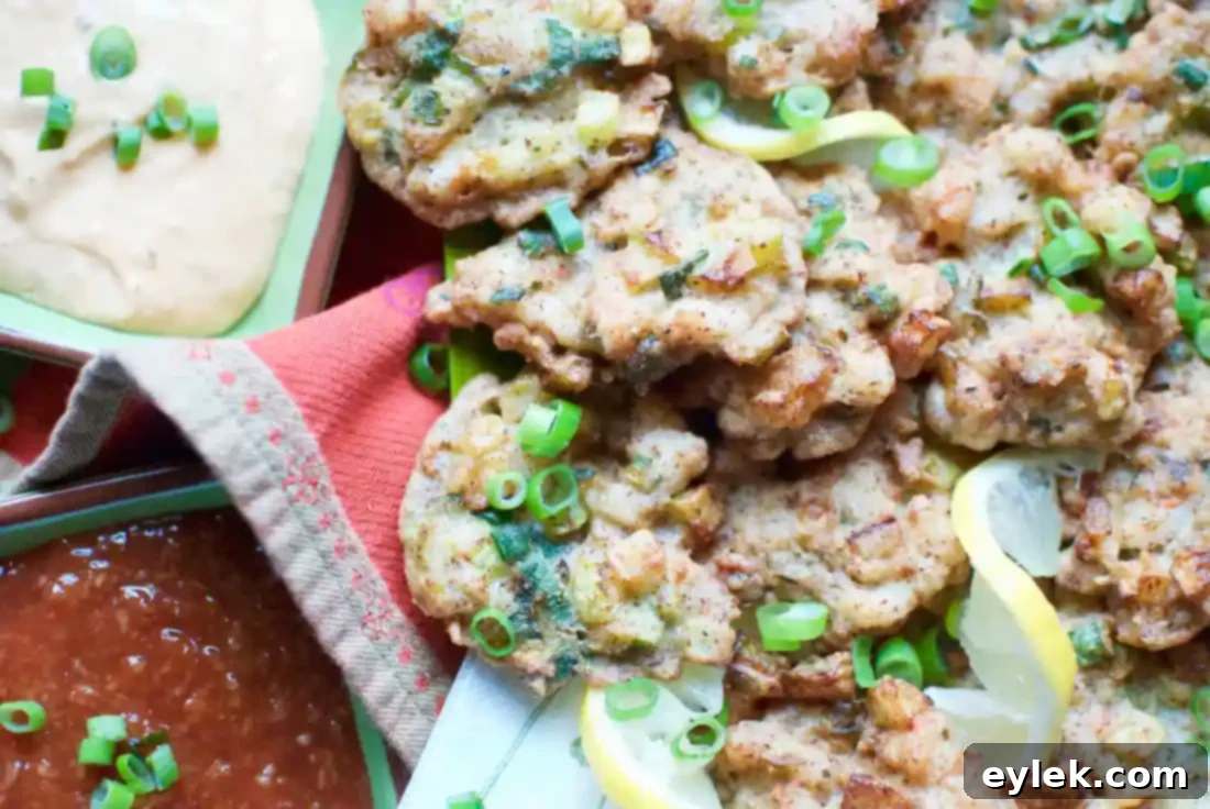 The Best Shrimp & Zucchini Fritters served with lemon