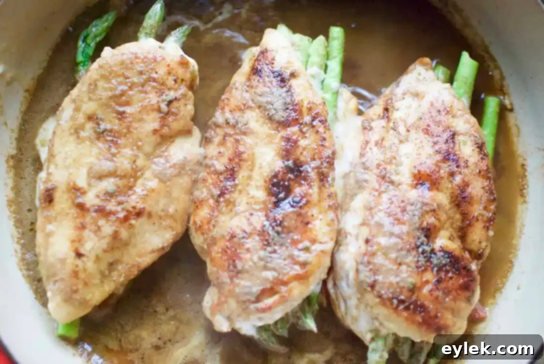 asparagus stuffed chicken with five spice sauce