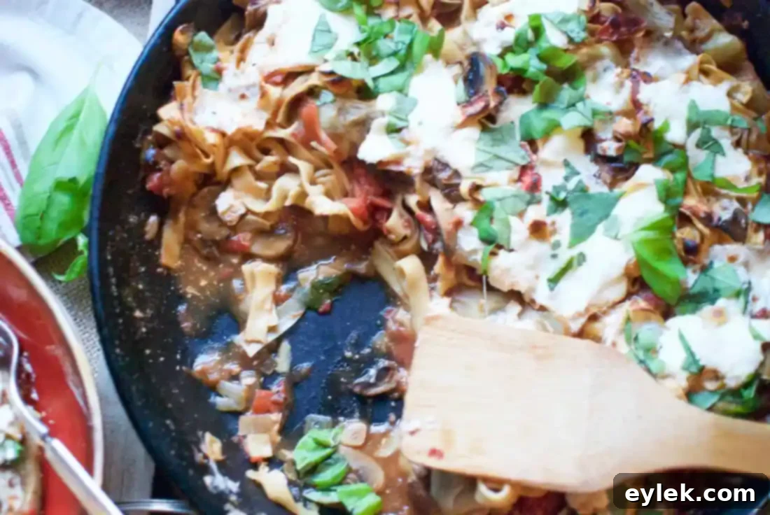 Serving of One-Pan Pasta with Ricotta, Artichokes & Mushrooms on a plate
