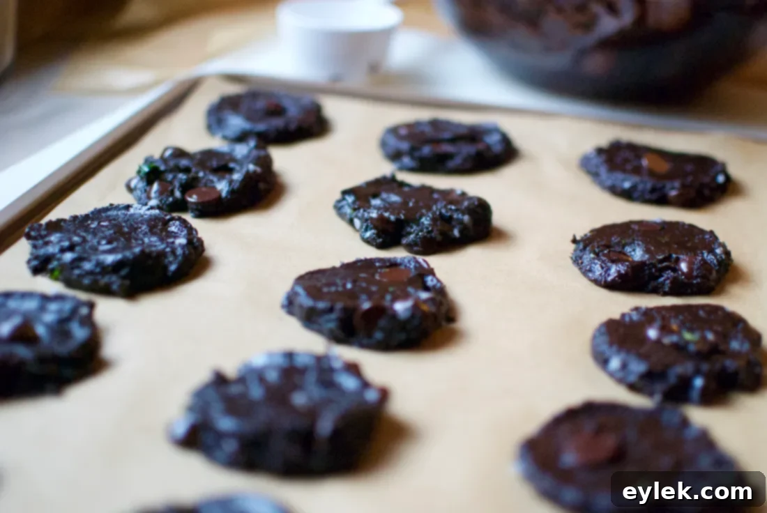 Baking sheet of gluten-free mint chocolate chip cookies ready for the oven