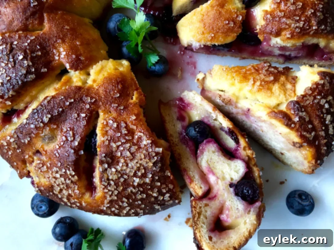Freshly baked Gluten-Free Blueberry & Lemon Curd Ring on a wire rack, cooling slightly.