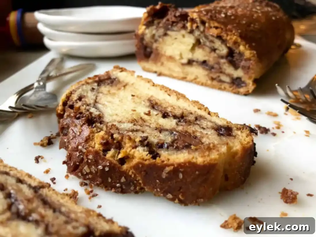 Gluten-Free Nutella Swirl Loaf on a cutting board, ready to be served
