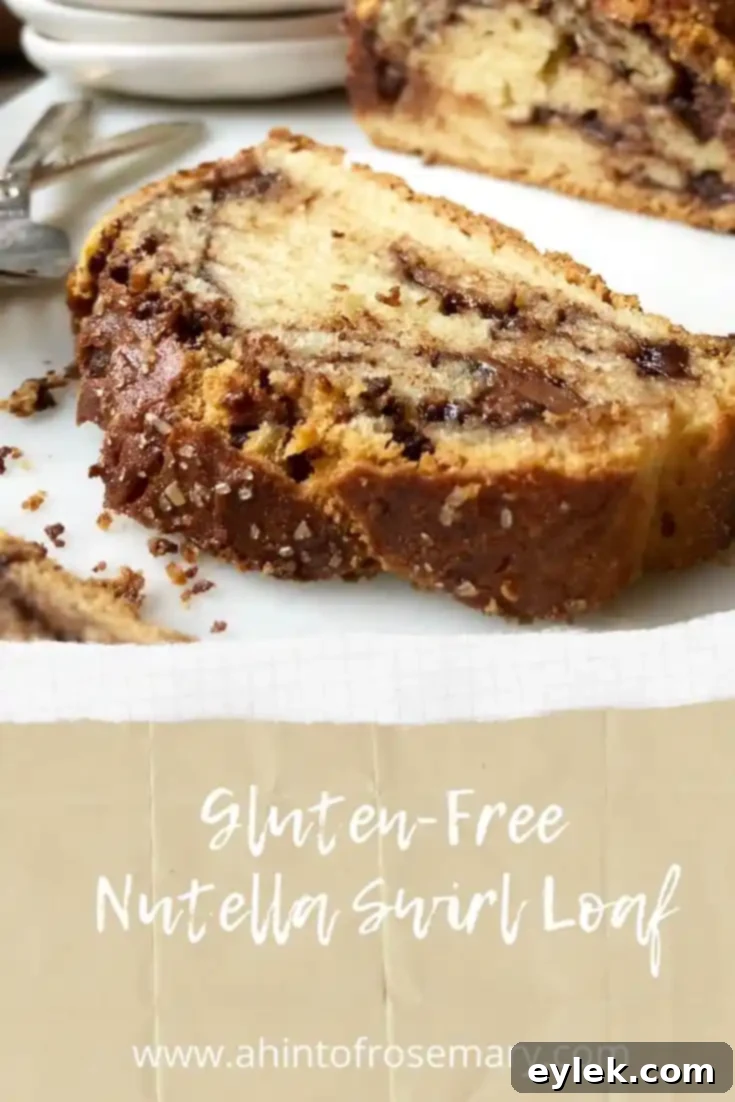 Beautifully sliced Gluten-Free Nutella Swirl Loaf on a serving board