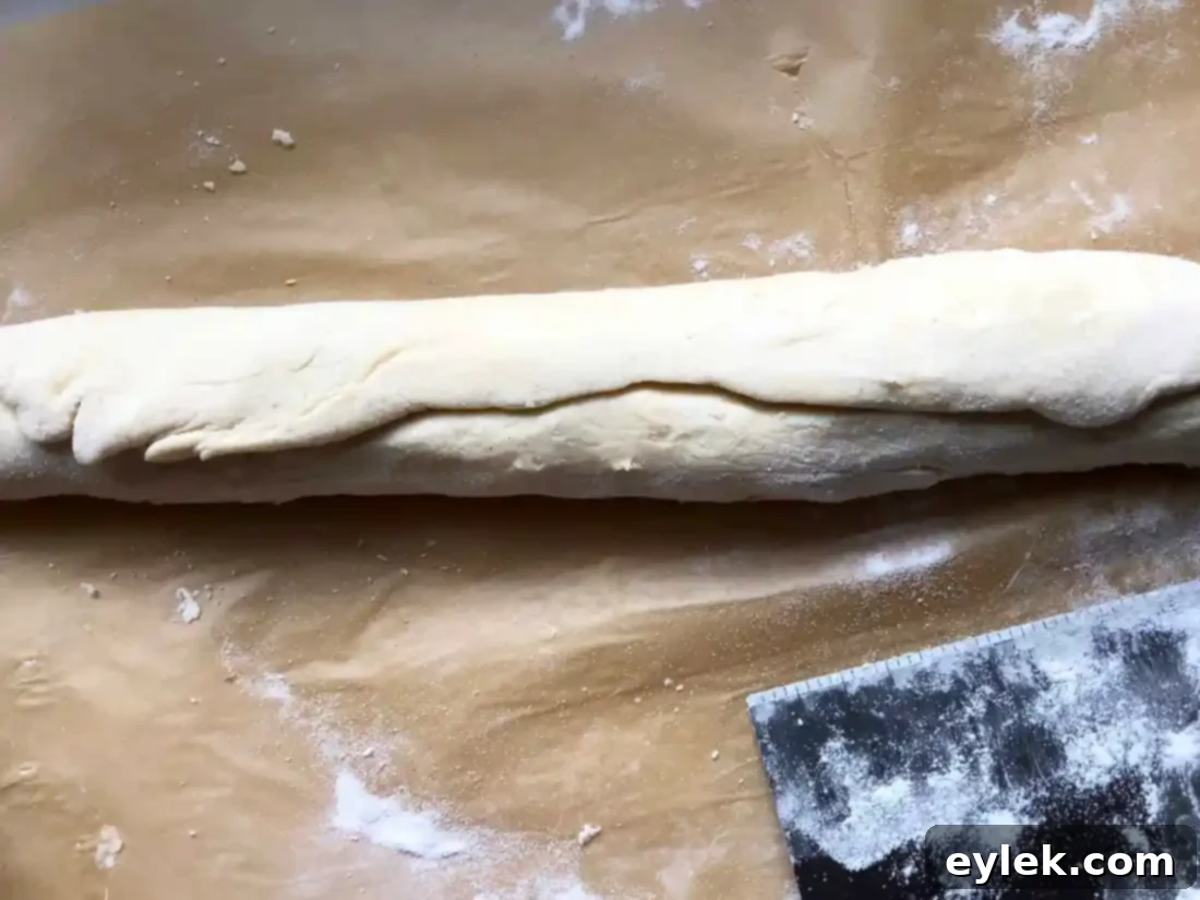 Gluten-Free brioche dough log with ends folded to the center
