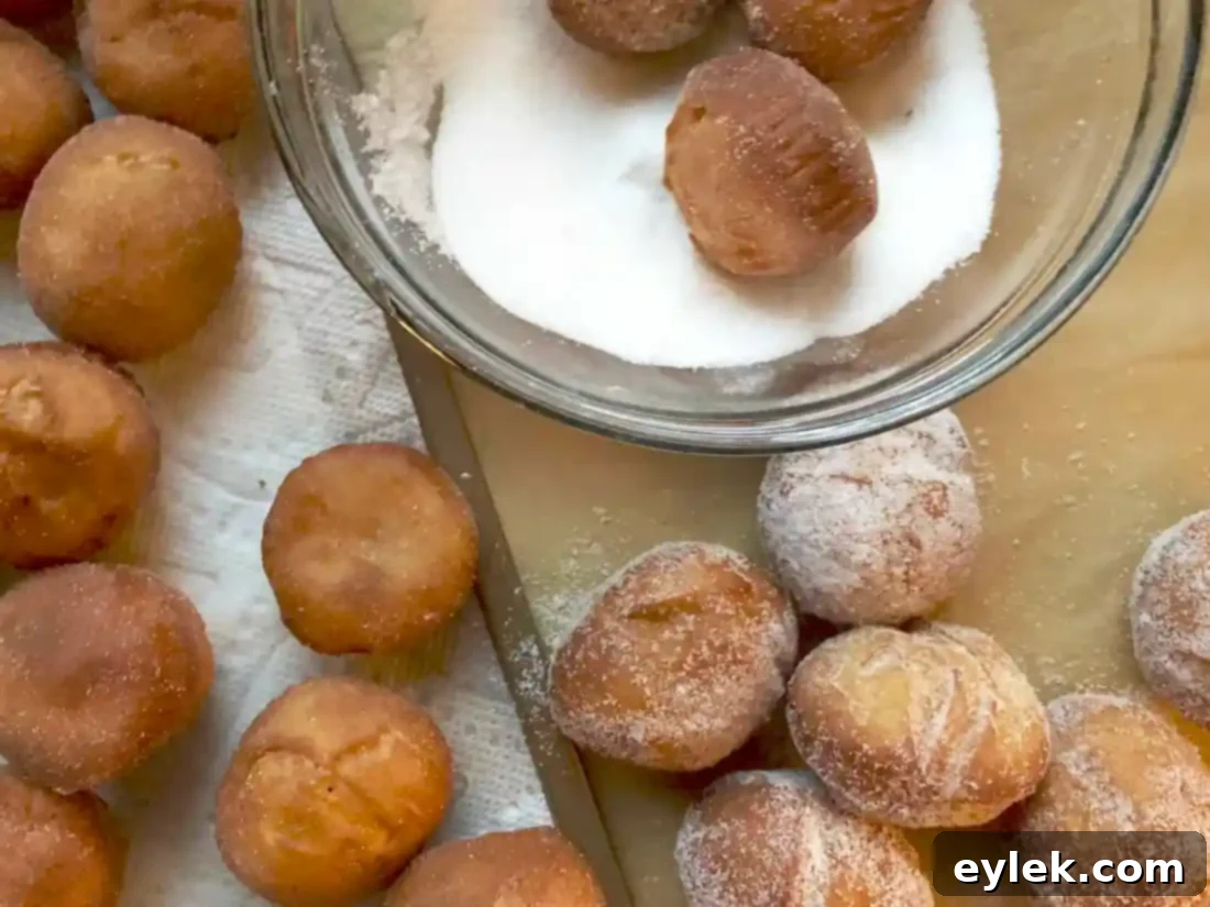 Gluten-Free Fried Zeppole draining on paper towels