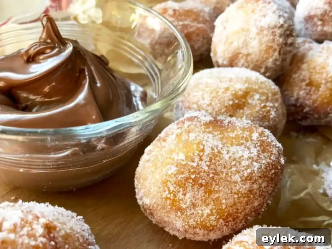 Gluten-Free Fried Zeppole dusted with sugar