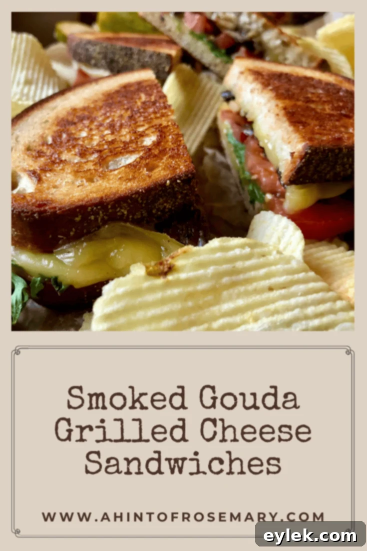 Plated smoked gouda grilled cheese sandwich, cut in half