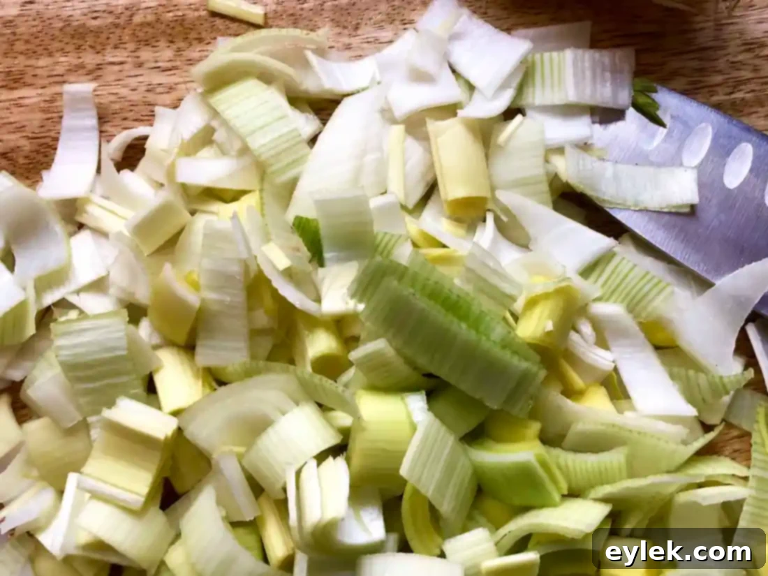 Sliced leeks soaking in a bowl of cold water to remove dirt.