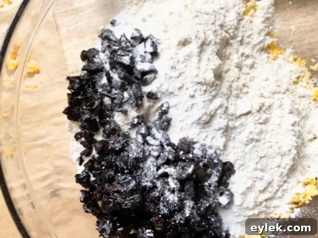 Close-up of sugar-coated dough balls ready for shaping.