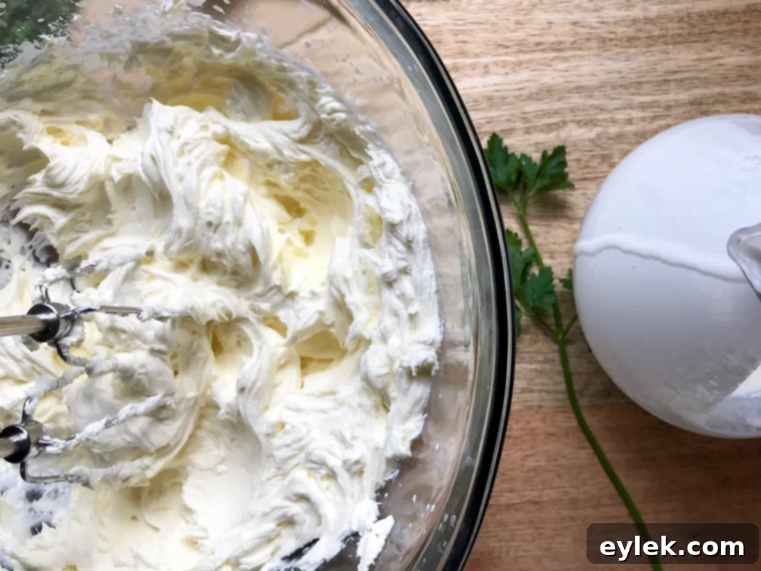 Ingredients for creamy herbed dip with lemon and dill