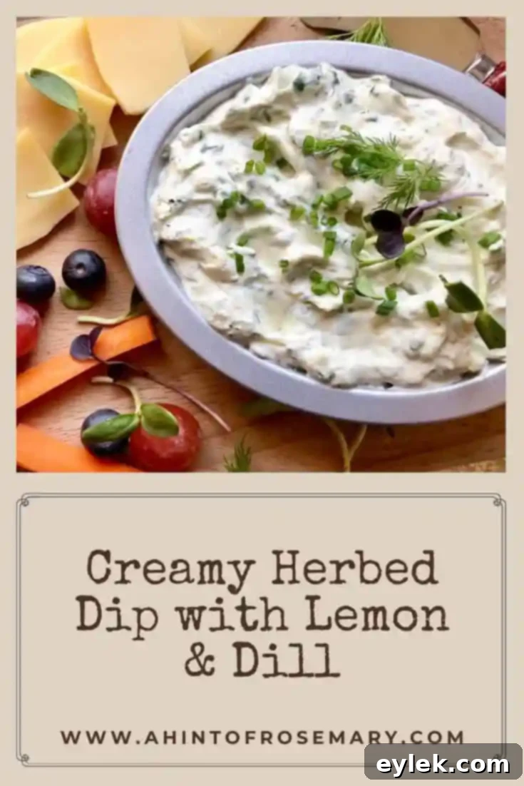 A small bowl of Creamy Herbed Dip with Lemon & Dill, garnished with fresh herbs, ready for serving.