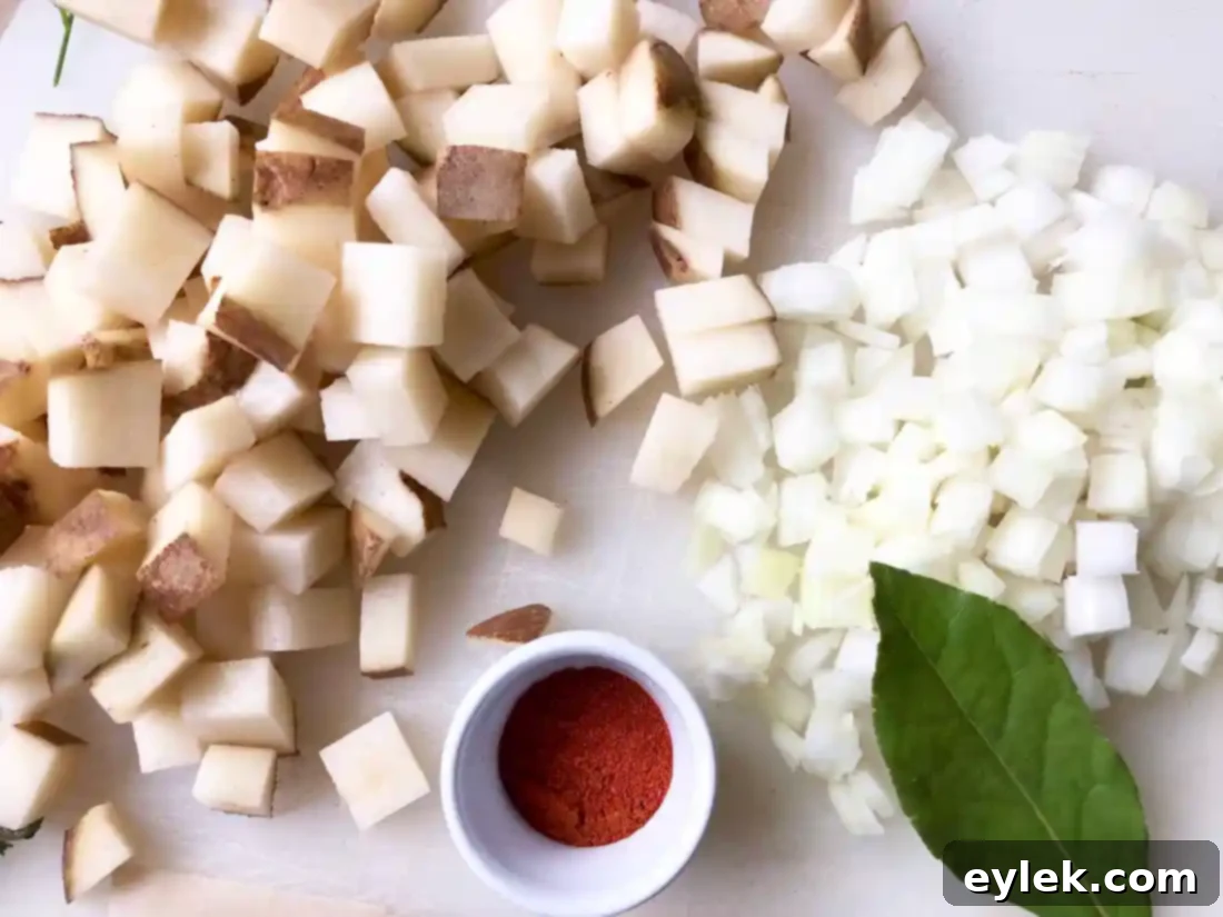 onions cooking in chorizo fat for Blushing Seafood Chowder