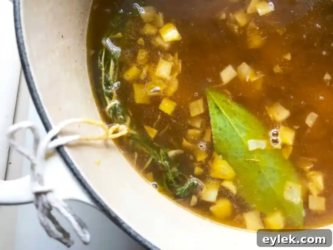 simmering chowder base for Blushing Seafood Chowder